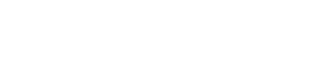 A sign that says "Village at Chesapeake Apartments" in black and white.