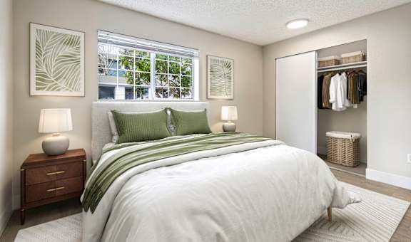 an image of a bedroom with a closet and a bed