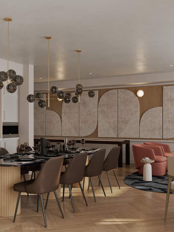 A modern kitchen with a dining table and chairs.