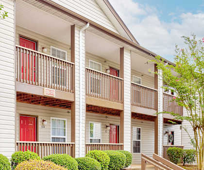 our apartments have a spacious courtyard with a red door