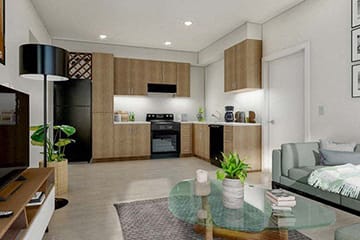 a kitchen and living room with a glass table