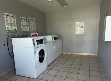 A laundry room with a washer and dryer.