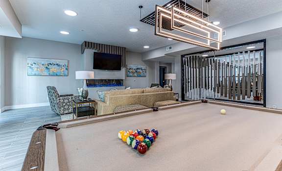 A pool table with a white ball and several colorful balls on it.at Tiffany Flats, Columbus, OH, 43231