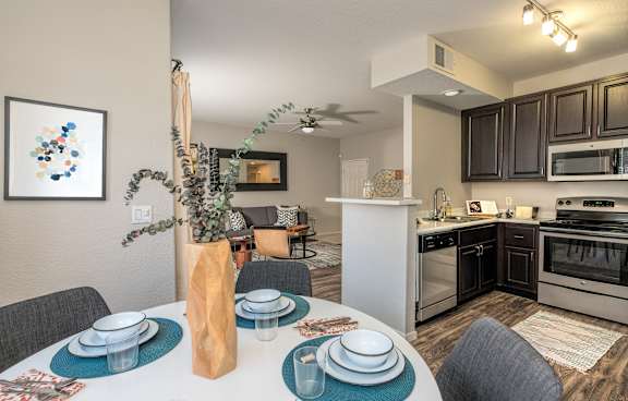 fully equipped kitchen and dining at Somerfield at Lakeside Apartments Elk Grove, CA