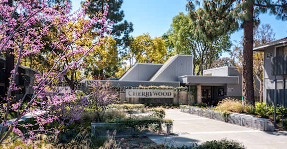 Cherrywood sign in front of a building at Cherrywood Apartments, San Jose