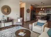 Thumbnail 4 of 33 - Living Room With Kitchen at The Tuscany on Pleasant View, Madison, Wisconsin