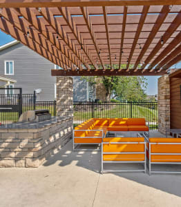 our apartments have a pool and lounge area with chairs and umbrellas