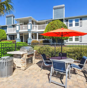 the preserve at ballantyne commons patio with table umbrella and chairs