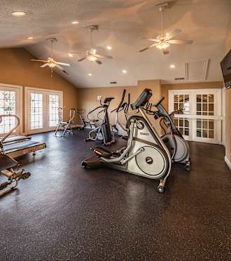Fitness Center with cardio and weightlifting equipment at Bexley Village, Greenwood
