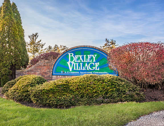 the sign at the entrance to bath farms with flowers