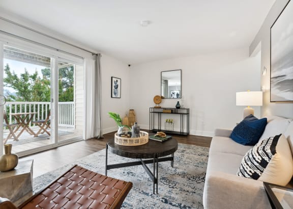 a living room with a couch and a coffee table