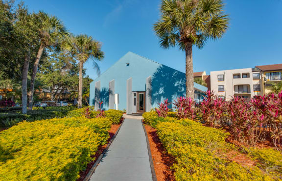 Modern clubhouse exterior at Belara Lakes Apartments in Tampa 