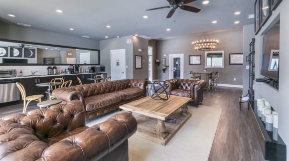 a large living room with couches and a coffee table