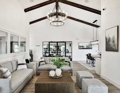 a living room with couches and a coffee table
