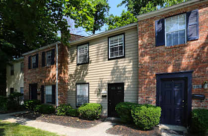 the front of a brick house with black doors at Walnut Creek Townhomes, Cincinnati, OH