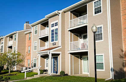 an apartment building with balconies and a street light  at Steeplechase Apartments, Ohio
