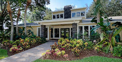 a house with a garden in front of it