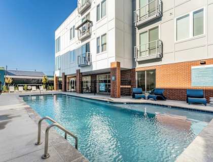 Swimming Pool Near a White Building at The Point on 38th, Norfolk