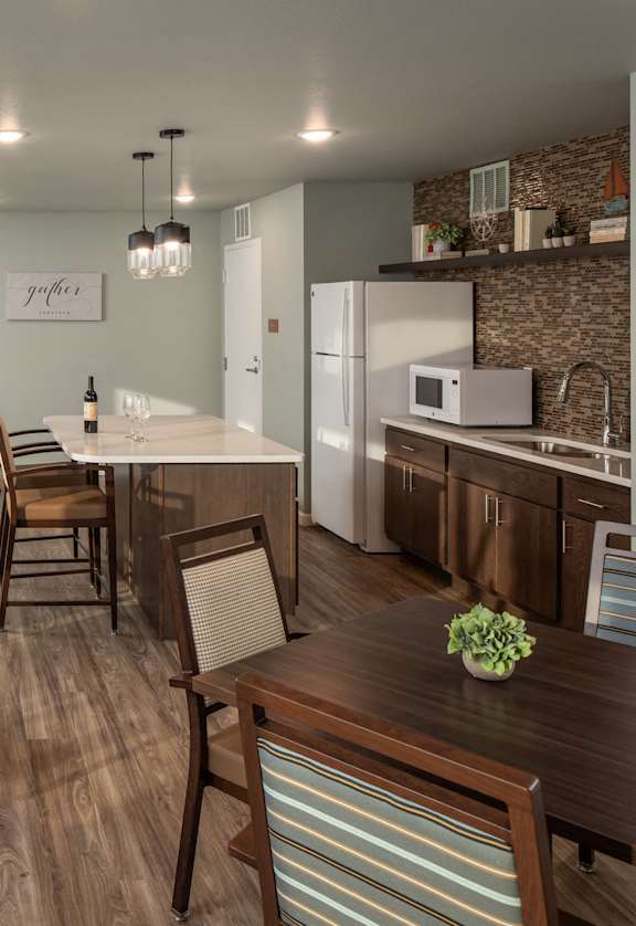 an open kitchen and dining room with a large table and chairs