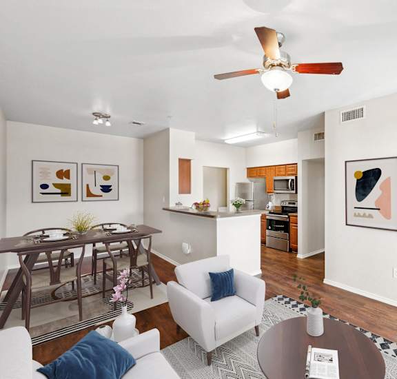 an open living room and dining room with a kitchen and a ceiling fan at Cypress Gardens, Cedar Park, 78613