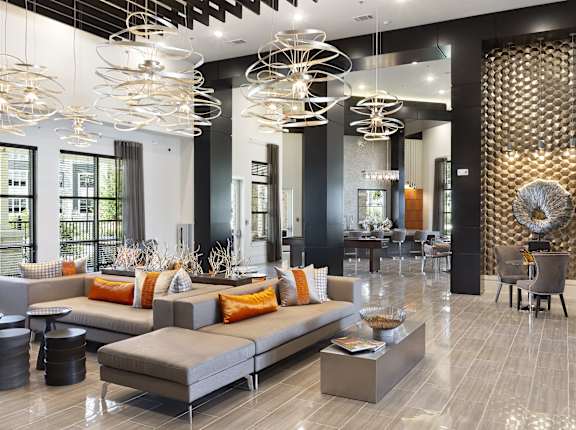 a living room with couches and chairs and a dining room at North Creek, Hutto, 78634
