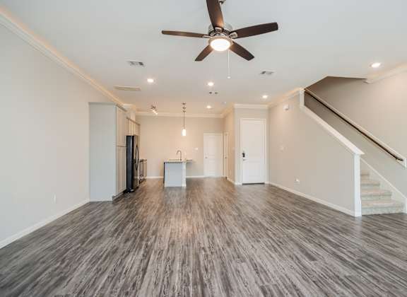 a living room with a ceiling fan