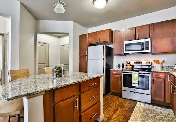 Remodeled kitchen view at Residences at The Streets of St. Charles in St. Charles, 63303