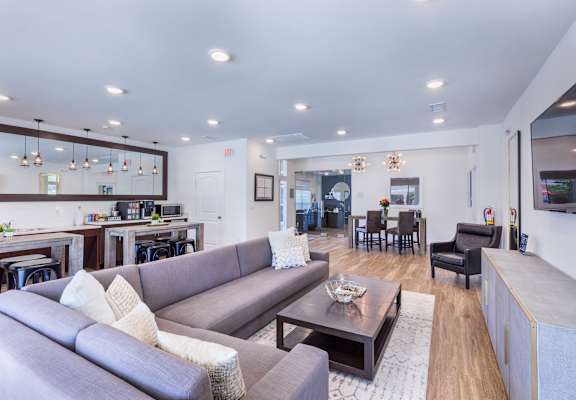 a living room with a couch and a table