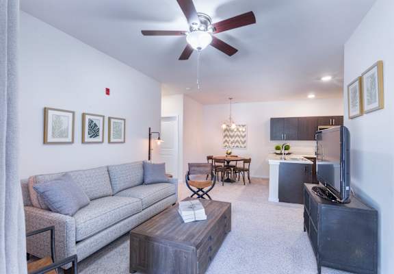a living room with a couch and a tv