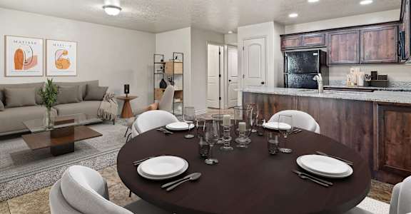 a dining room and living room with a table and chairs