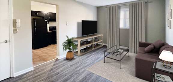 a living room with a couch and a tv at Park Place, Richmond, KY, 40475