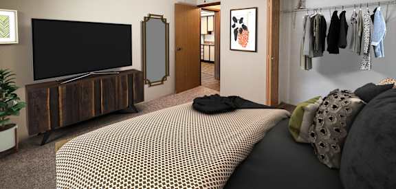 A bedroom with a bed, a television, and a mirror.