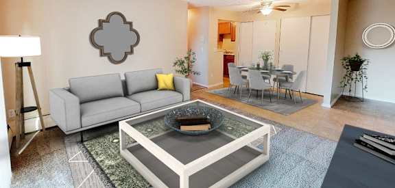 a living room with a couch and a table  at Summit East - A Senior Community, Cincinnati, Ohio
