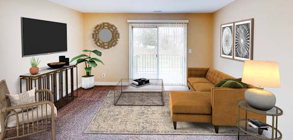 a living room with a couch and a tv  at The Wynds, Kettering, OH, 45429
