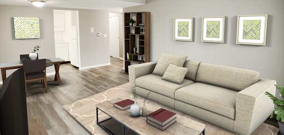 a living room with a couch and a coffee table  at The Wynds, Kettering, OH, 45429