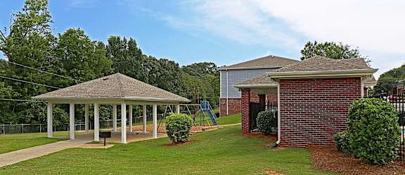 A Gazebo is in the Middle of a Grassy Area at Magnolia Court Apartments, Birmingham, AL