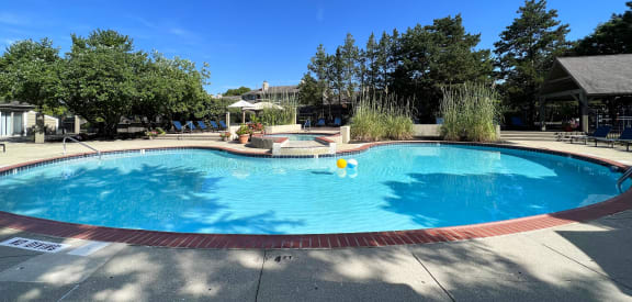 a swimming pool at the resort on a sunny day at Deercross Apartments, Cincinnati, OH, 45236