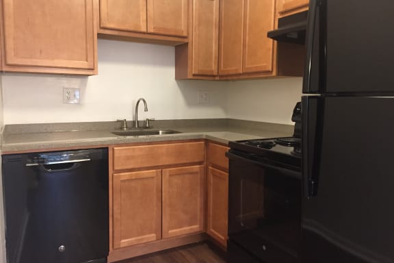 Wooden cabinets in kitchen at Walnut Creek Townhomes, Cincinnati, 45236
