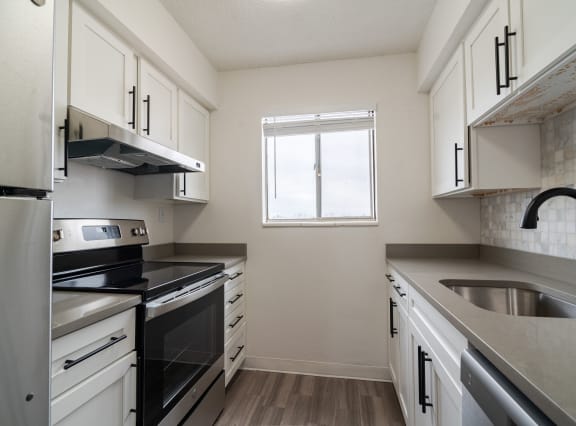 Kitchen area at Postmark at Littleton Apartments, Littleton, Colorado