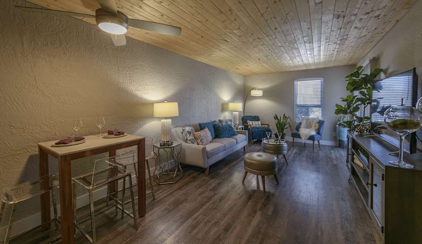Furnished apartment living area shown at Icon on Central.