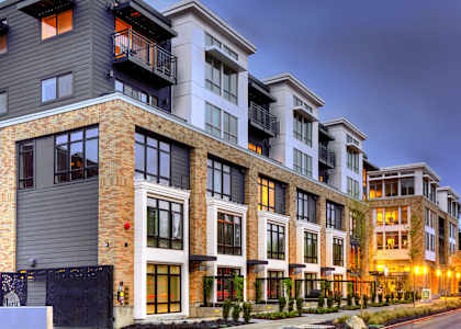 Building facade at dusk at The Lyric Apartments, Washington, 98102