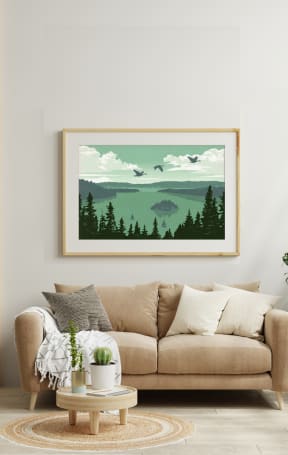 a photograph of a living room with a painting of a forest and mountains in the background