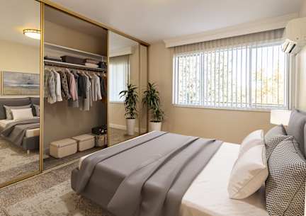 a bedroom with a large bed and a large mirror