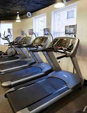 Modern gym amenities at The Woodward Building Apartments in Washington, DC 20005