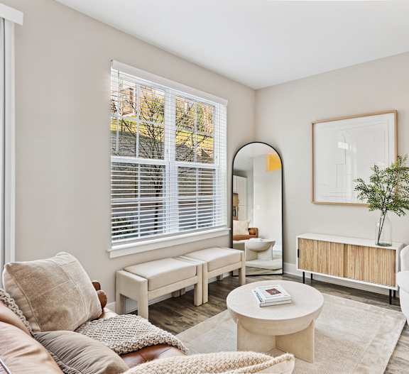 Broadstone Upper Westside Apartments Kitchen Island Kitchen with Breakfast Bar Ample Cabinet Space and Self Closing Drawers