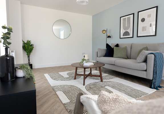 a living room with a couch and a coffee table