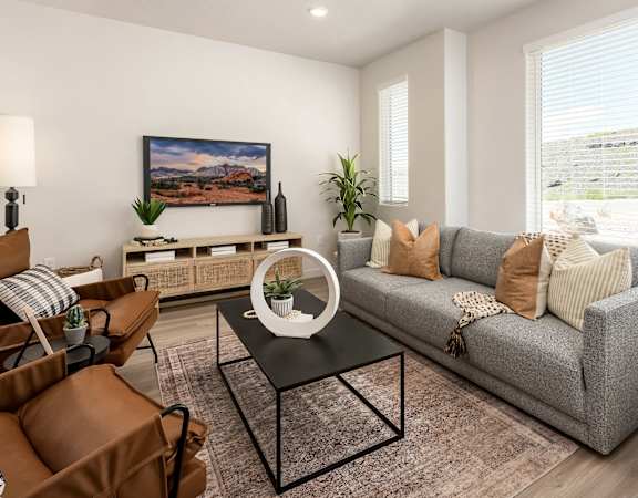 an open living room with a couch and a coffee table