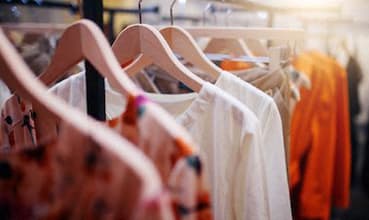 a rack of clothes on a hanger