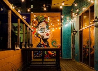 a mural of a woman on the side of a building