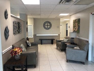 Lobby with comfortable furniture and tile floors